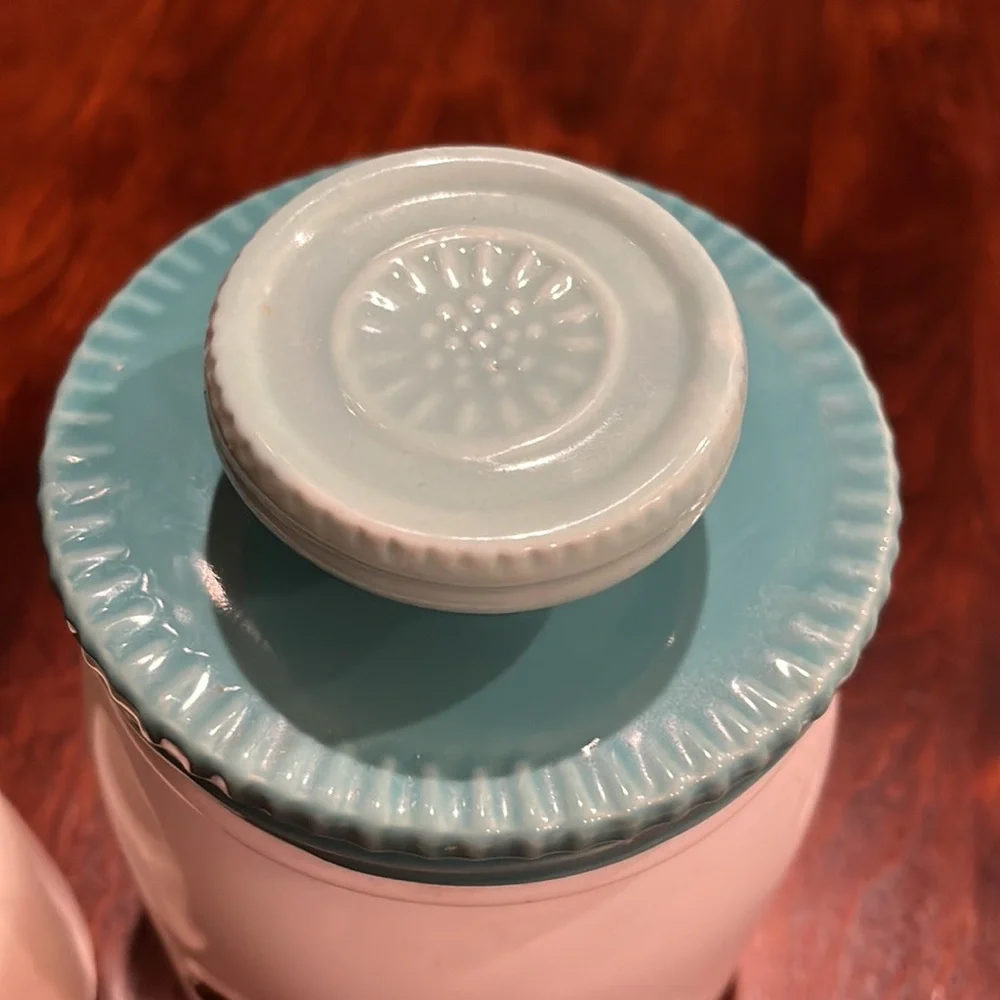 Two ceramic containers with covers and chalkboard labels